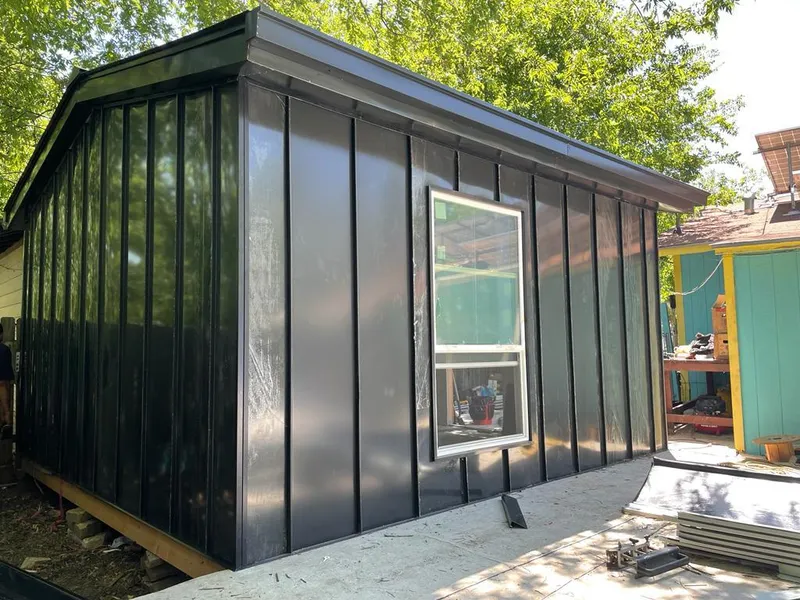 Black standing seam metal wall panels for Roof Inspection in Eastvale